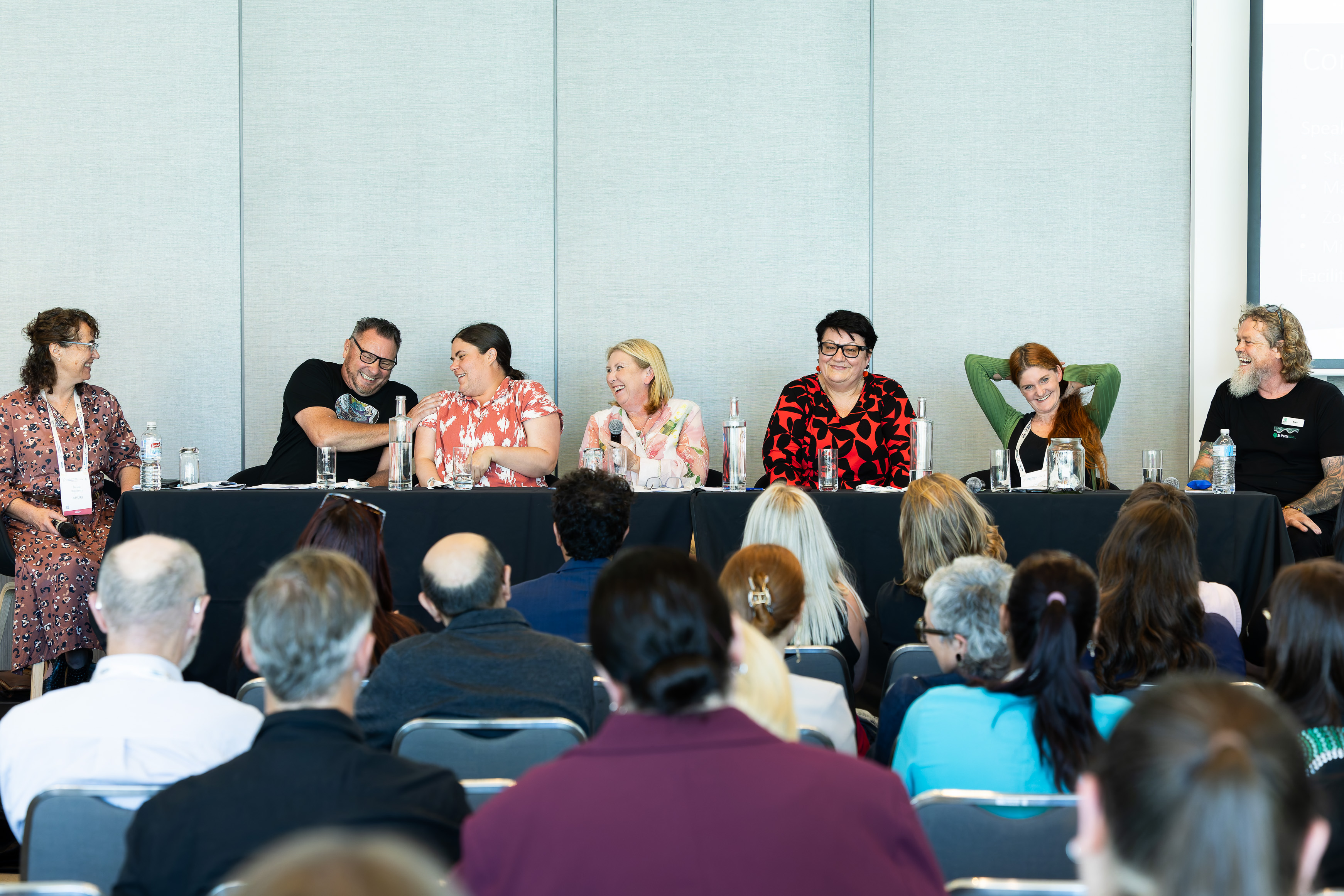 Lived experience speakers participate in a panel discussion at NHC25