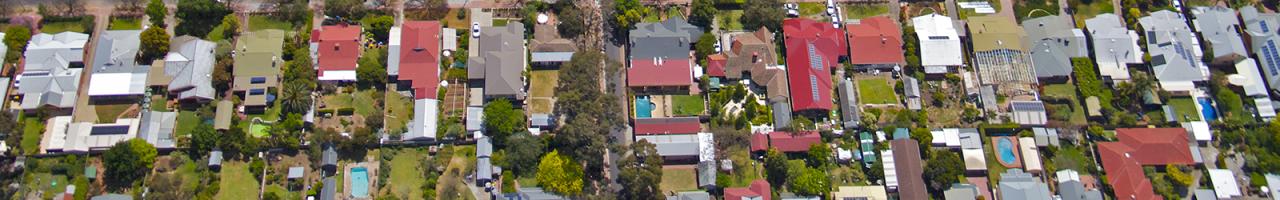 birdseye shot of houses 1600x250