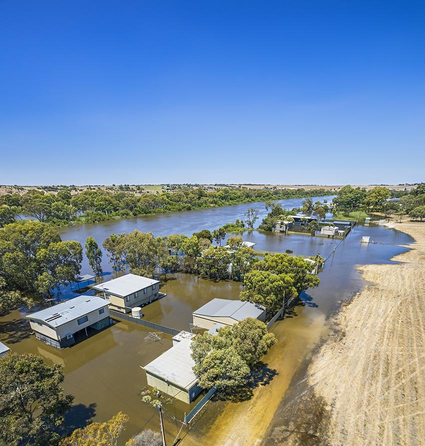 Aerial view of a flooded rural Australian town in daylight