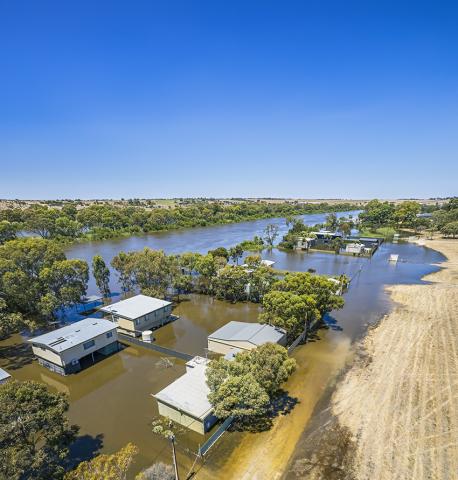 Aerial view of a flooded rural Australian town in daylight