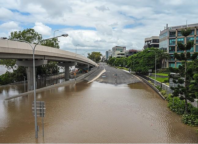 Road and bridge partially flooded due to natural disaster