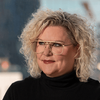 This is a picture of Kelly Grigson, a speaker at the webinar