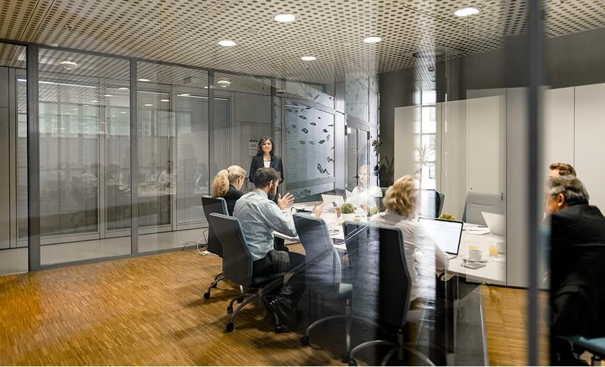 A group of business people having a meeting in a board room