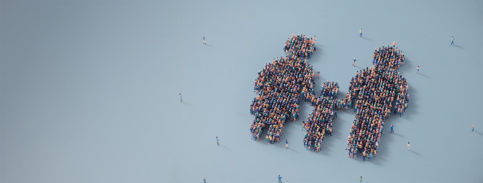 Aerial view of a plain blue background, with 2 larger people and one smaller child depicted by groups of people standing in organised shapes
